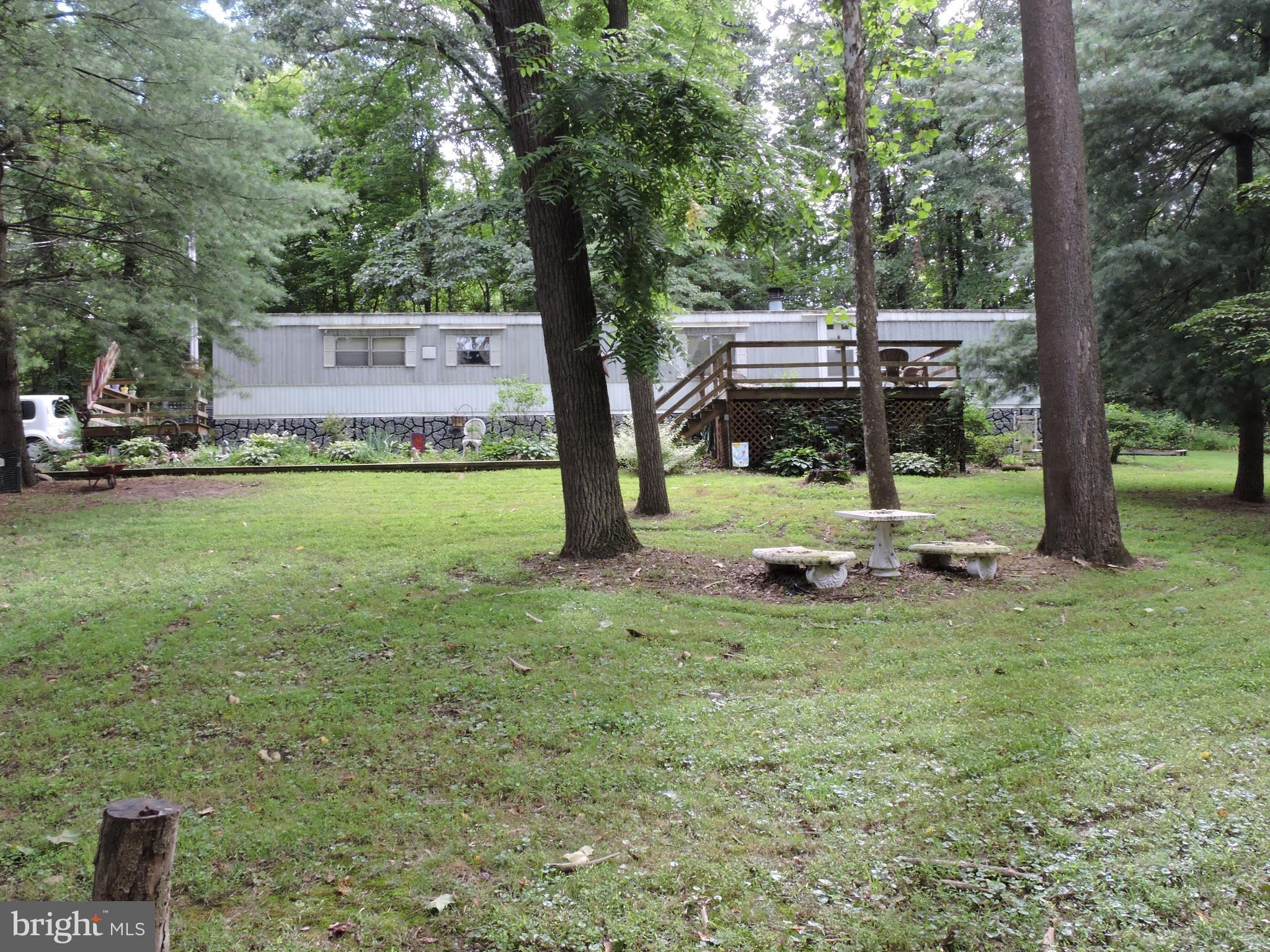 Spacious 2 bdrm, 2 bath home on 3 acres is ready