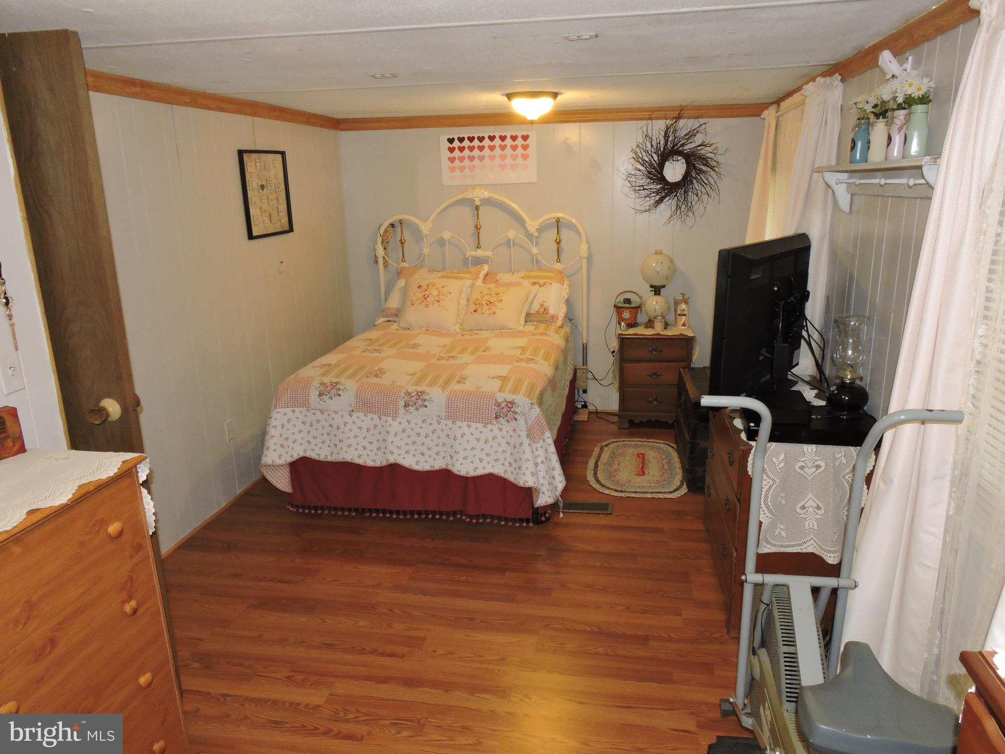 59 Cool Hollow Road Falling Waters, WV 25419 - Photo 14 of 20 Master bedroom is roomy, has plenty of room for