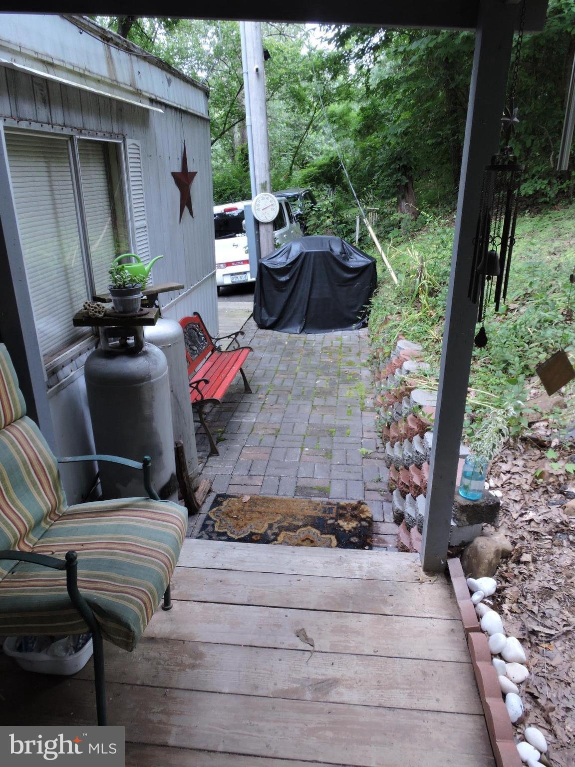 59 Cool Hollow Road Falling Waters, WV 25419 - Photo 20 of 20 Covered rear porch.