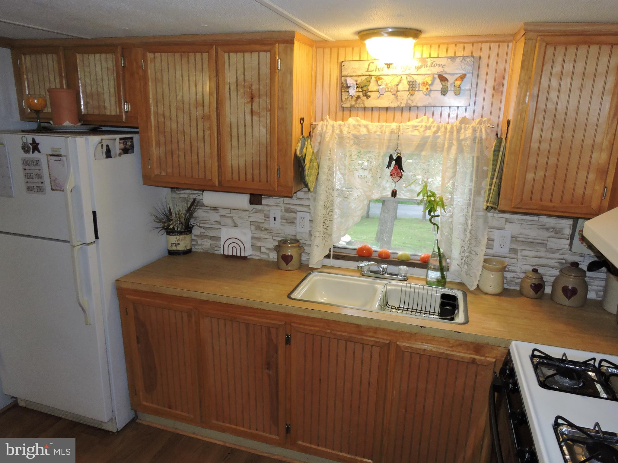 59 Cool Hollow Road Falling Waters, WV 25419 - Photo 10 of 20 And easy care laminate flooring