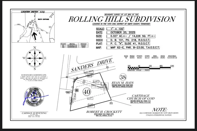 a picture of a book and a white wooden fence