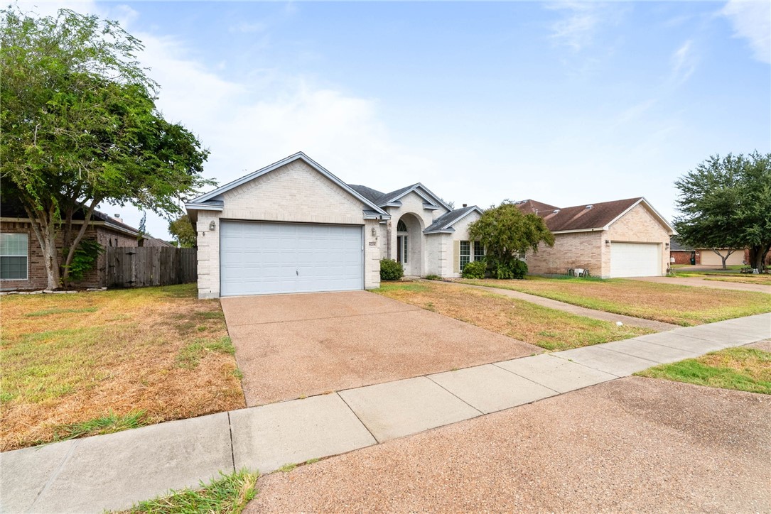 8205 Tango Circle Corpus Christi, TX 78414 - Photo 2 of 22 a house with a outdoor space