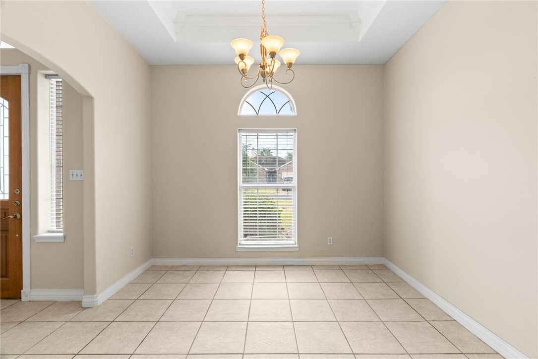 8205 Tango Circle Corpus Christi, TX 78414 - Photo 4 of 22 a view of an empty room with window