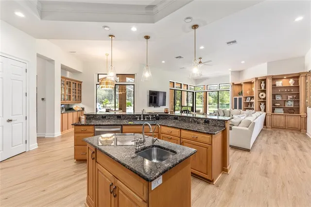 a view of a livingroom with furniture window and wooden floor