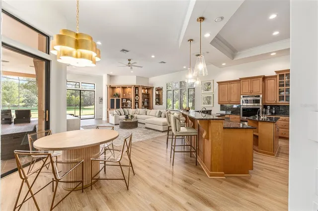 a bedroom with furniture and a flat screen tv
