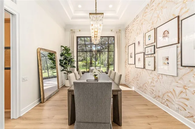 a view of walk in closet with clothes