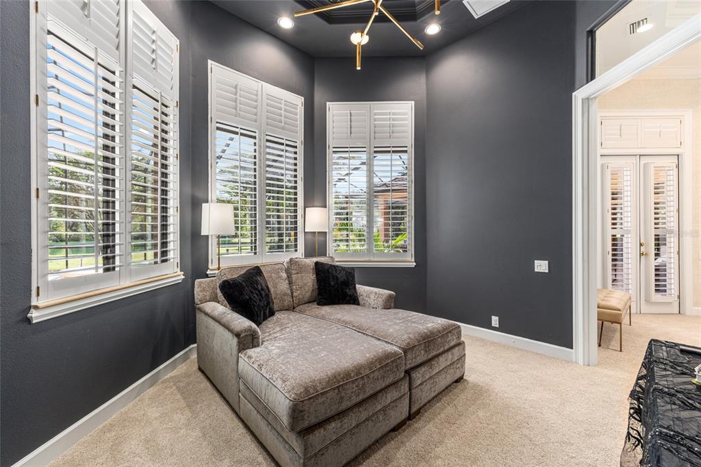 708 Southeast 44th Road Ocala, FL 34480 - Photo 36 of 76 a bedroom with a bed and a large window