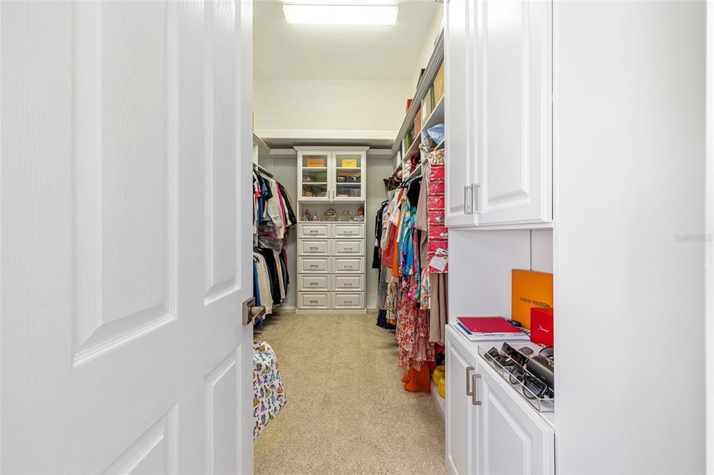 708 Southeast 44th Road Ocala, FL 34480 - Photo 39 of 76 a view of walk in closet with clothes