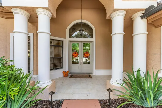 a front view of a house with a garage