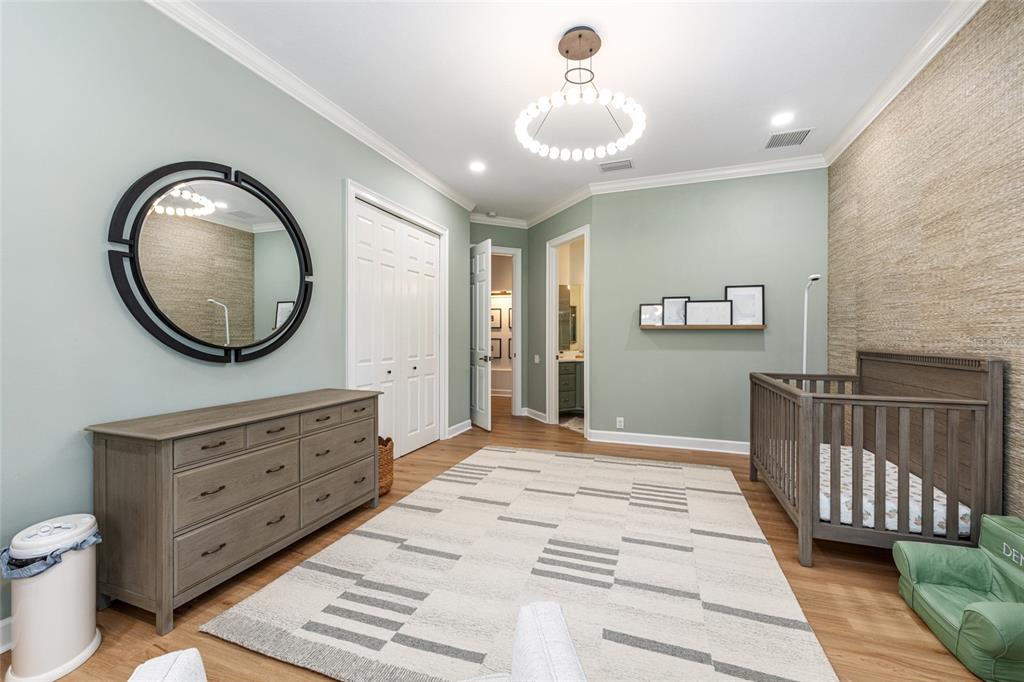 708 Southeast 44th Road Ocala, FL 34480 - Photo 49 of 76 a bedroom with a bed and a dresser