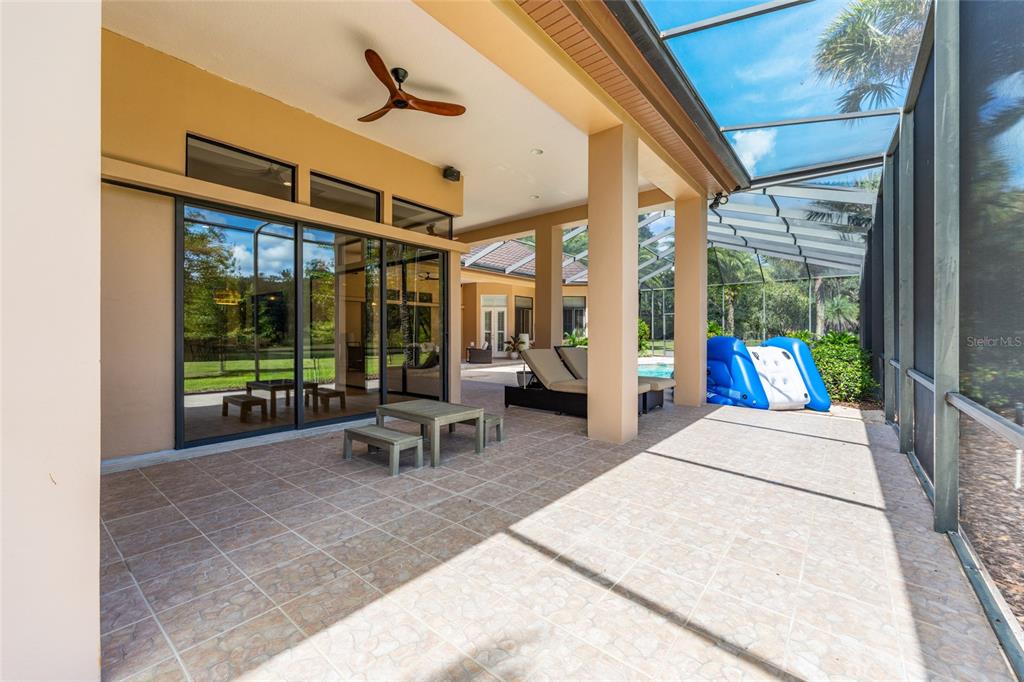 708 Southeast 44th Road Ocala, FL 34480 - Photo 58 of 76 a building outdoor space with patio furniture and potted plants