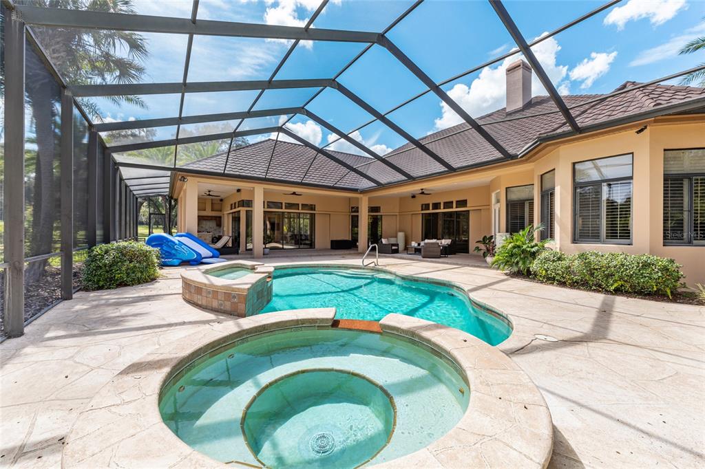 708 Southeast 44th Road Ocala, FL 34480 - Photo 61 of 76 a swimming pool with outdoor seating yard and patio