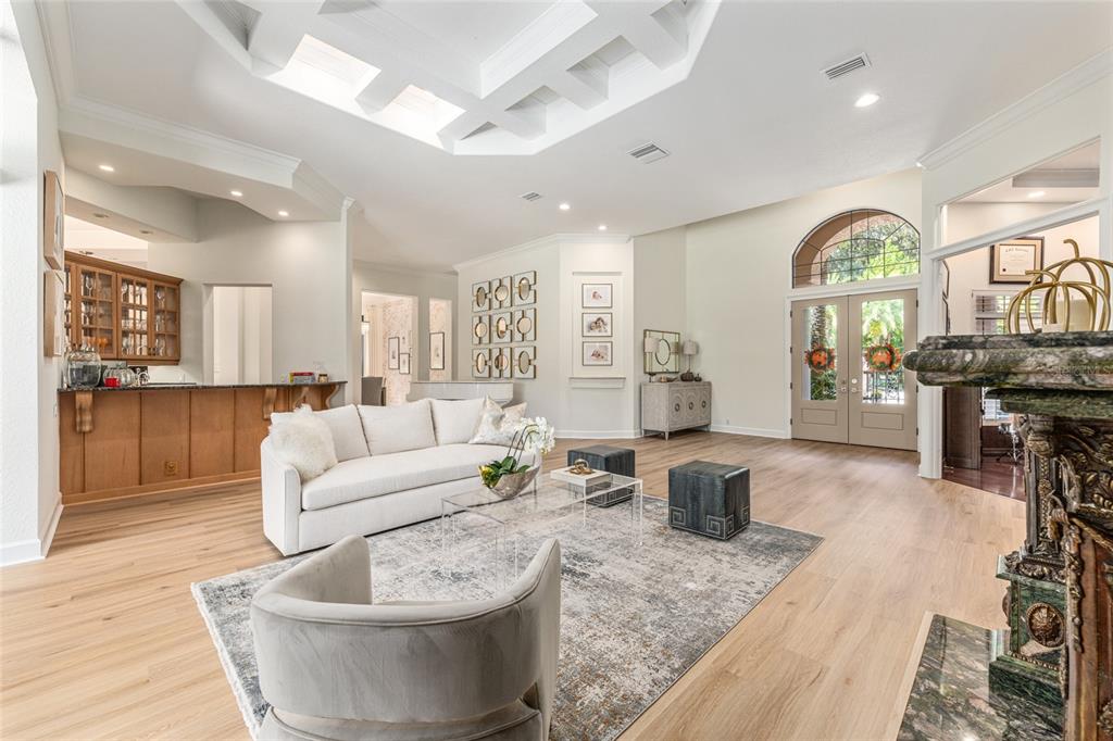 708 Southeast 44th Road Ocala, FL 34480 - Photo 8 of 76 a living room with fireplace furniture and a wooden floor