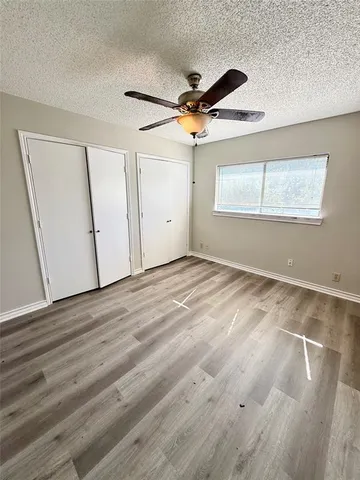 a room with table and mirror