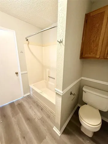 a bathroom with a sink a mirror and vanity