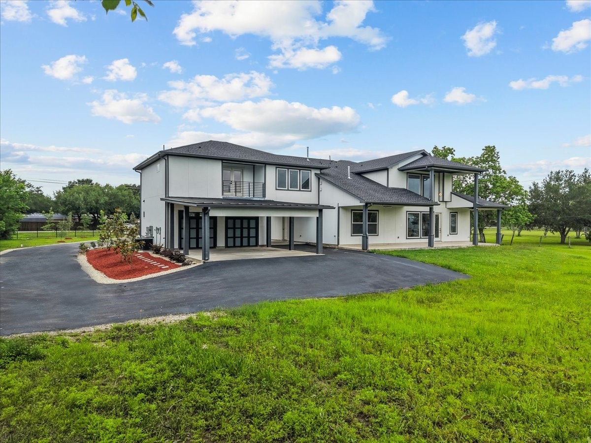 3237 Harkey Road Pearland, TX 77584 - Photo 43 of 46 Spacious covered parking and oversized drive for multiple vehicles.