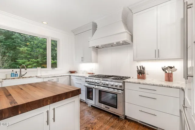 a picture of a bench in front of a white wall