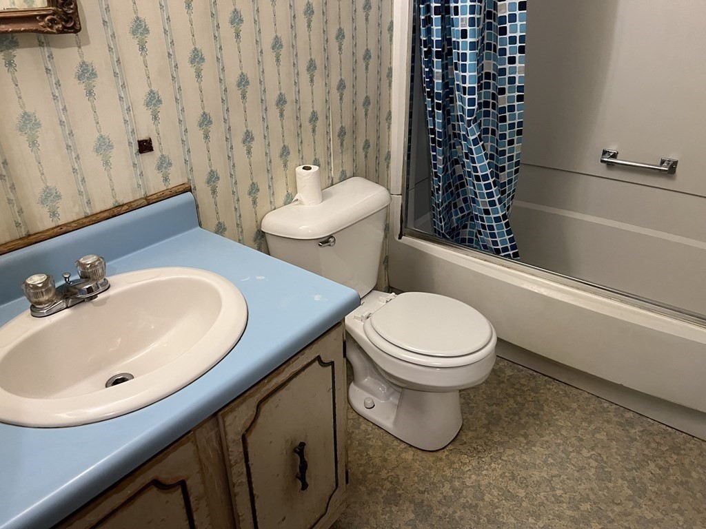 290 Little Alum Road Brimfield, MA 01010 - Photo 17 of 42 a bathroom with a sink a toilet and shower