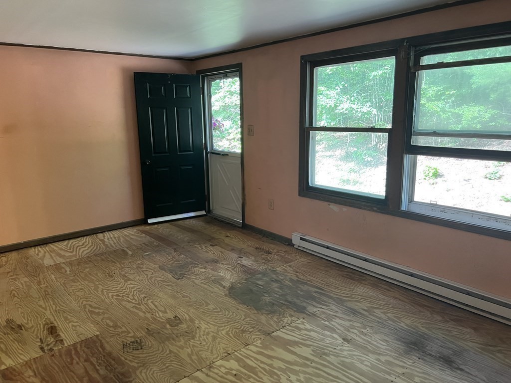 290 Little Alum Road Brimfield, MA 01010 - Photo 21 of 42 an empty room with a window