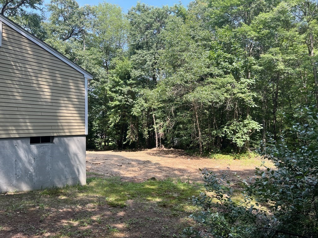 290 Little Alum Road Brimfield, MA 01010 - Photo 6 of 42 a backyard of a house with lots of green space