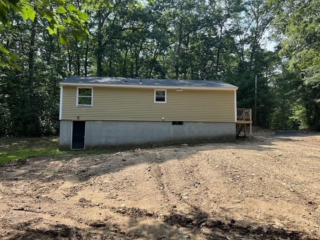 290 Little Alum Road Brimfield, MA 01010 - Photo 8 of 42 a front view of a house with a yard