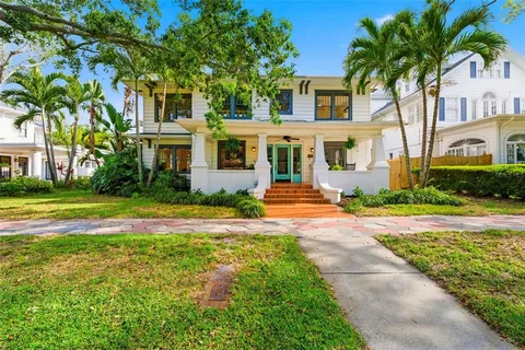 a front view of a house with a rug
