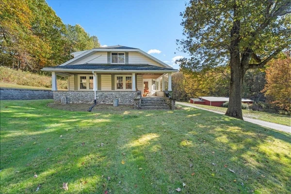 30 Tobin Road Leicester, MA 01611 - Photo 2 of 33 a front view of a house with a yard