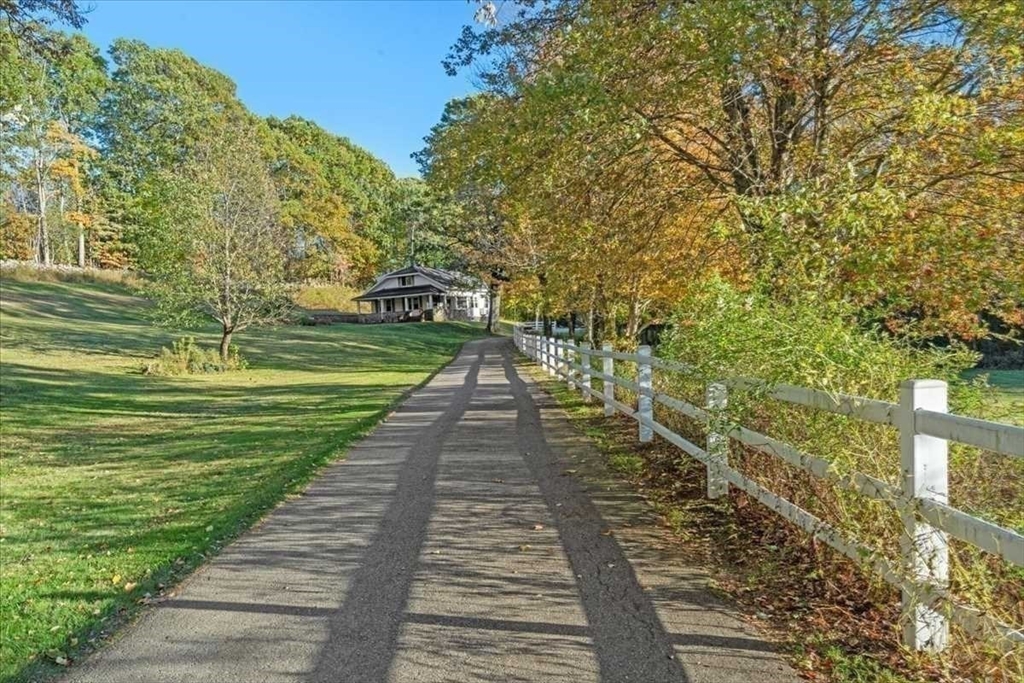 30 Tobin Road Leicester, MA 01611 - Photo 24 of 33 a view of a pathway both side of the house