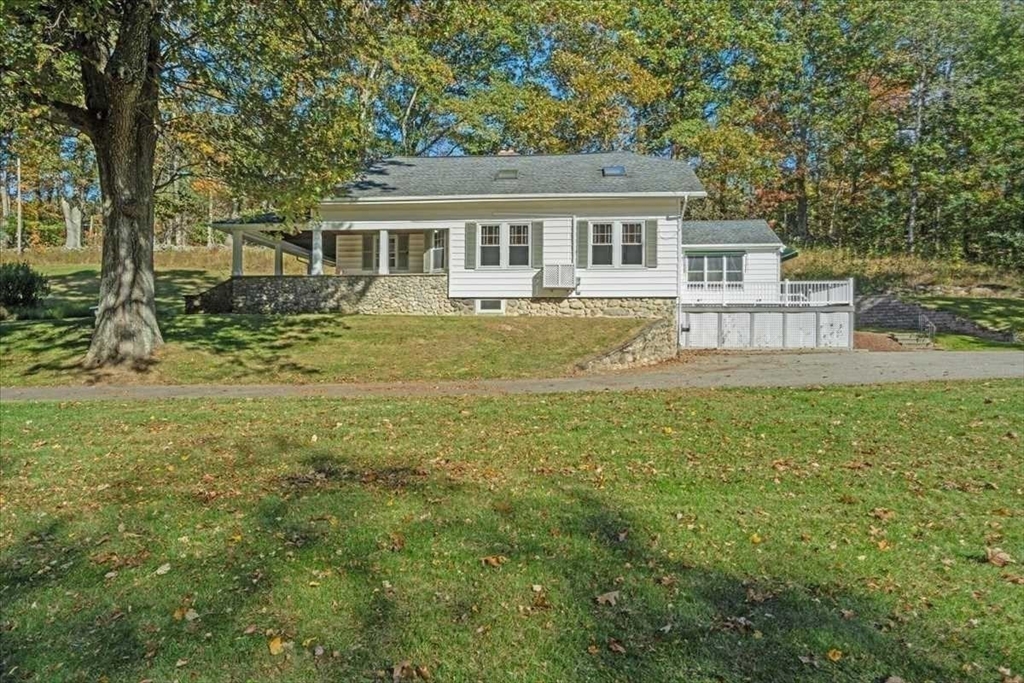 30 Tobin Road Leicester, MA 01611 - Photo 26 of 33 a front view of a house with a yard