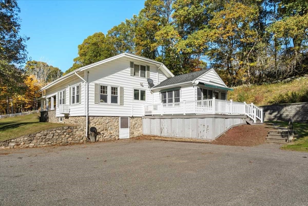 30 Tobin Road Leicester, MA 01611 - Photo 28 of 33 a front view of a house with a yard