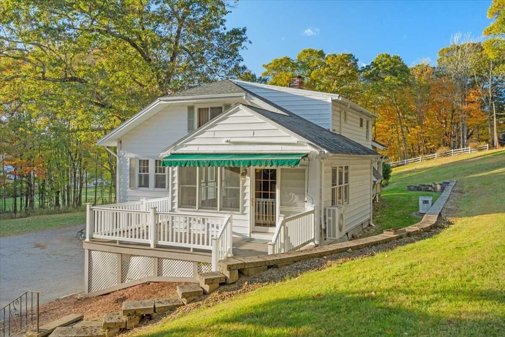 30 Tobin Road Leicester, MA 01611 - Photo 30 of 33 a front view of a house with a yard