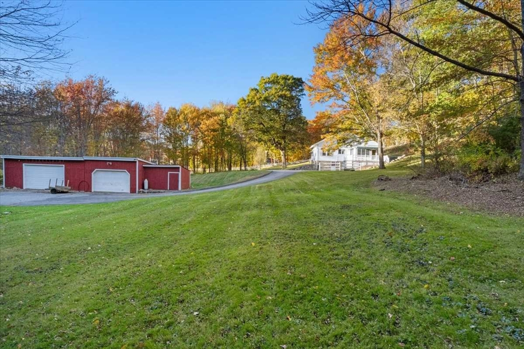 30 Tobin Road Leicester, MA 01611 - Photo 31 of 33 a view of a yard with an outdoor space