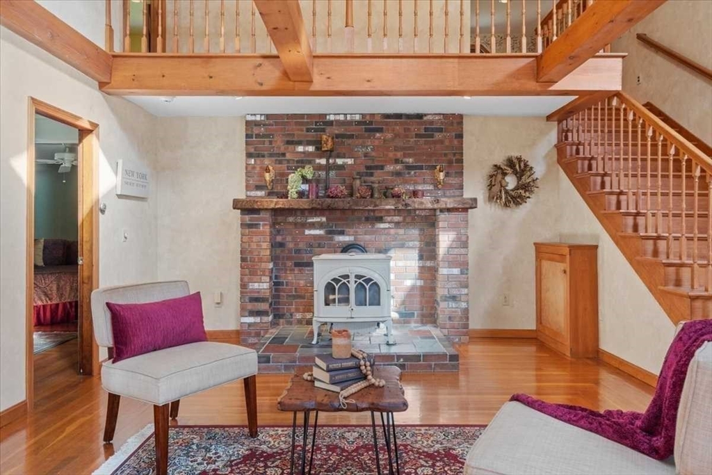 30 Tobin Road Leicester, MA 01611 - Photo 6 of 33 a view of a livingroom with furniture and a fireplace