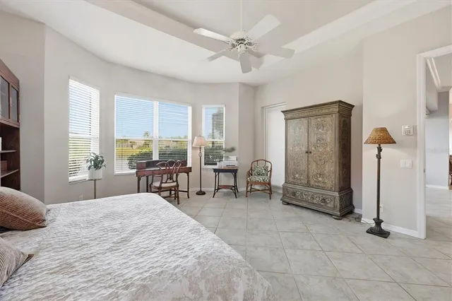 a spacious bathroom with a double vanity sink a mirror and a shower