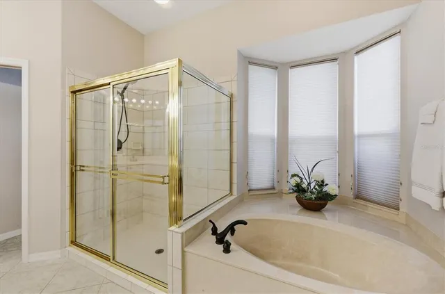 a bathroom with a sink double vanity and a mirror