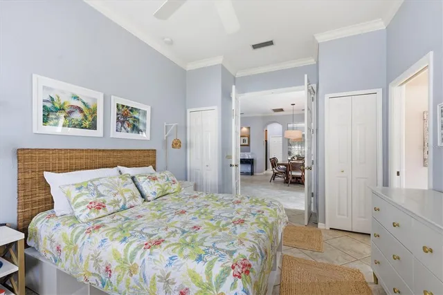 a living room with fireplace furniture and a floor to ceiling window