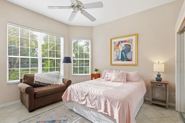 a view of a patio with dining table and chairs
