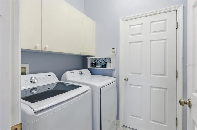 a view of a lake with a house in the background