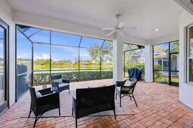 an aerial view of a house with a garden and trees