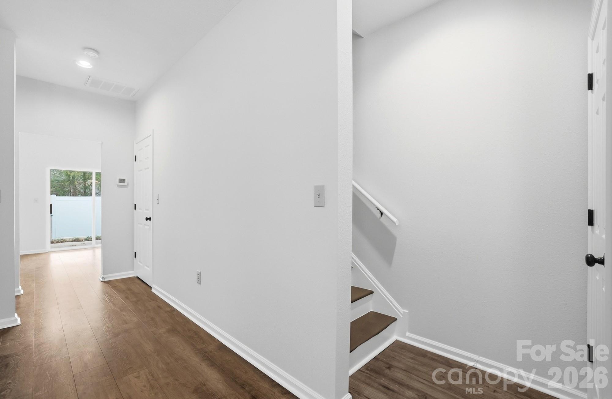 711 Stone Village Drive Fort Mill, SC 29708 - Photo 24 of 46 a view of hallway with wooden floor