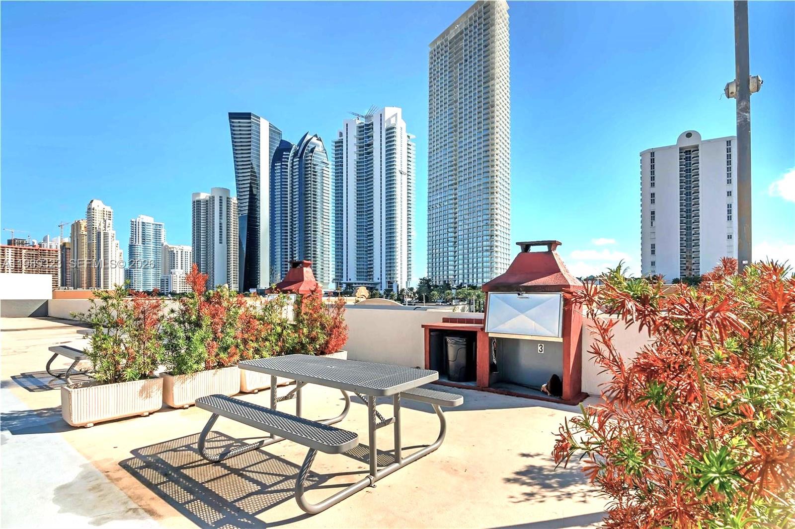 17011 North Bay Road, Unit 1007 Sunny Isles Beach, FL 33160 - Photo 25 of 28 a view of outdoor space yard and patio