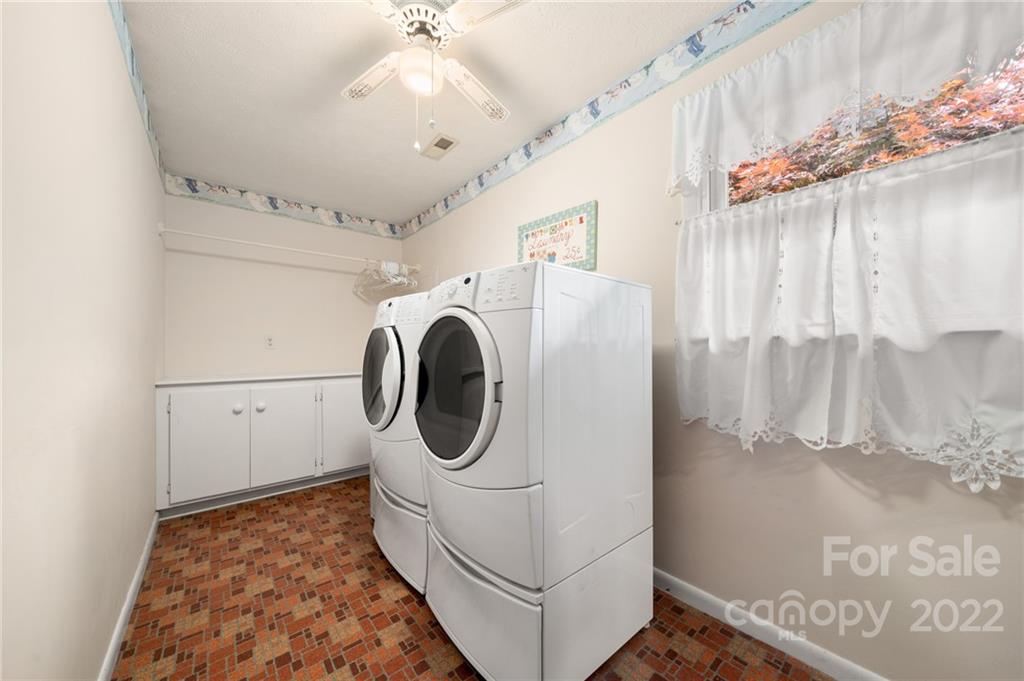 2480 Ridge Road Hendersonville, NC 28792 - Photo 19 of 48 a utility room with dryer and washer