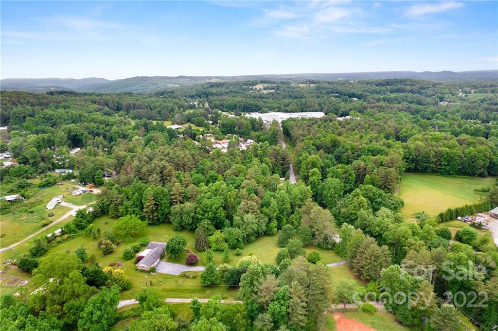 2480 Ridge Road Hendersonville, NC 28792 - Photo 45 of 48 a view of a lake with a city