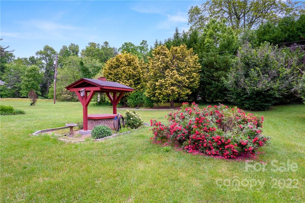 2480 Ridge Road Hendersonville, NC 28792 - Photo 7 of 48 a view of a garden with a slide