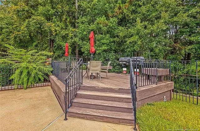 a view of a lake with houses in the back