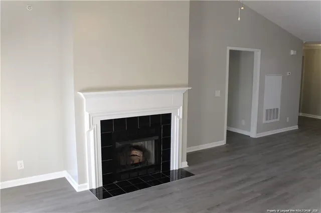 a living room with a fireplace