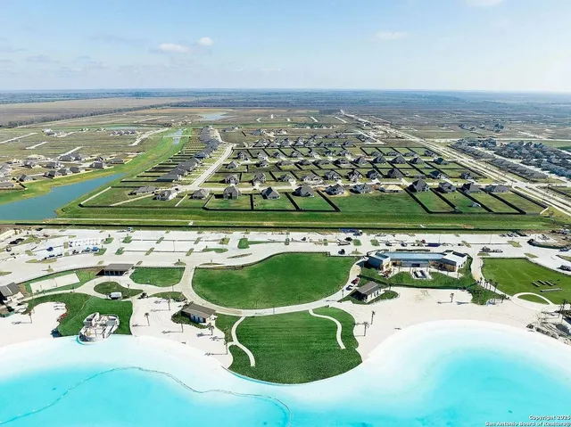 a view of a table and chairs in the garden