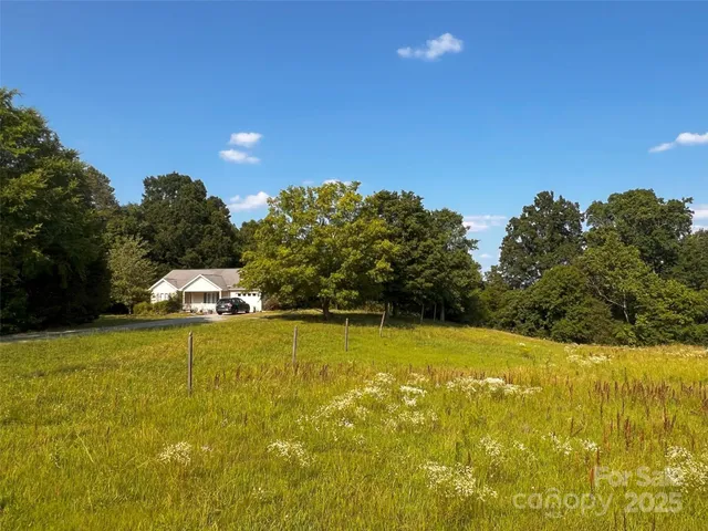 a view of a swimming pool and an outdoor seating