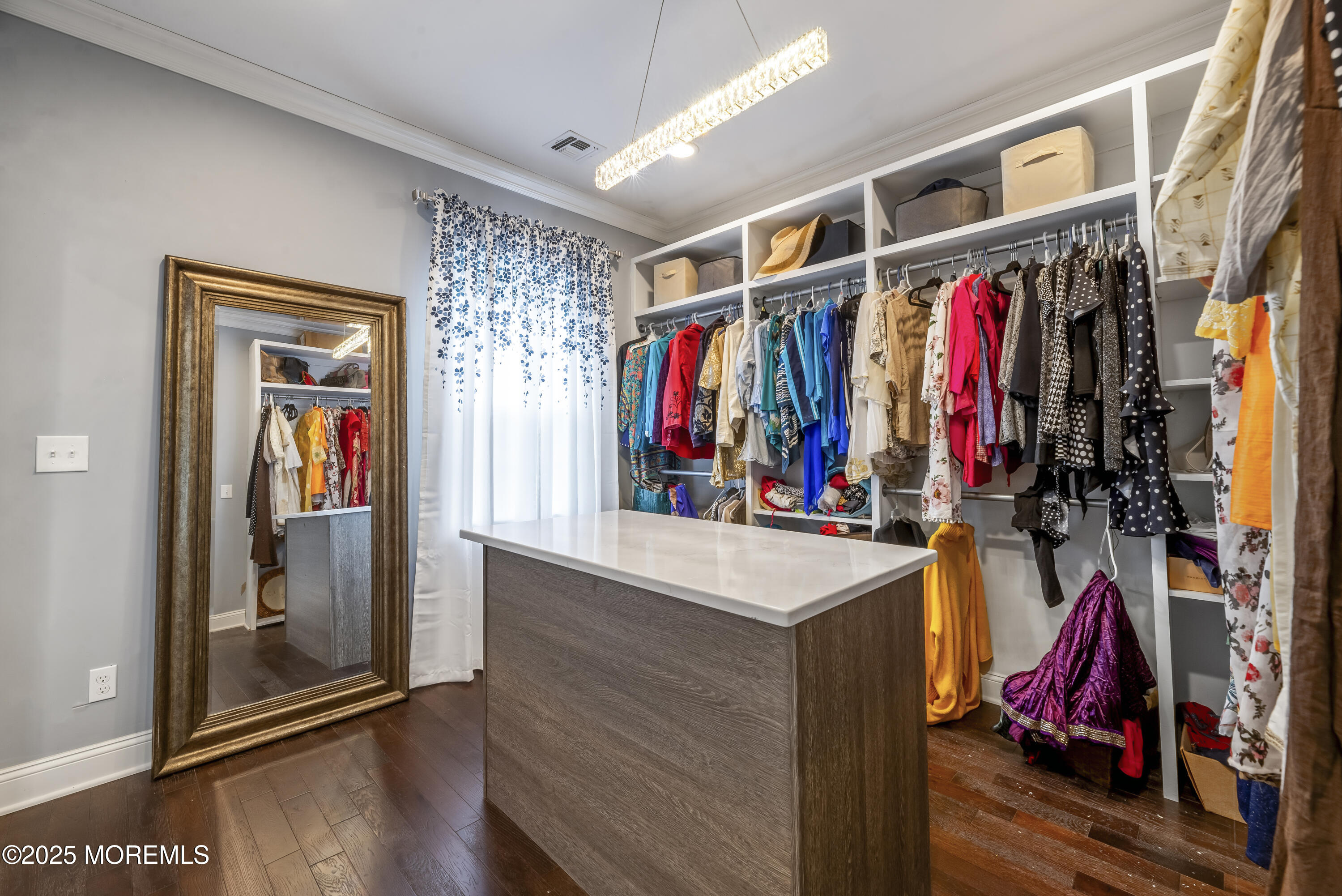 832 Holmdel Road Holmdel, NJ 07733 - Photo 24 of 44 a view of walk in closet with clothes