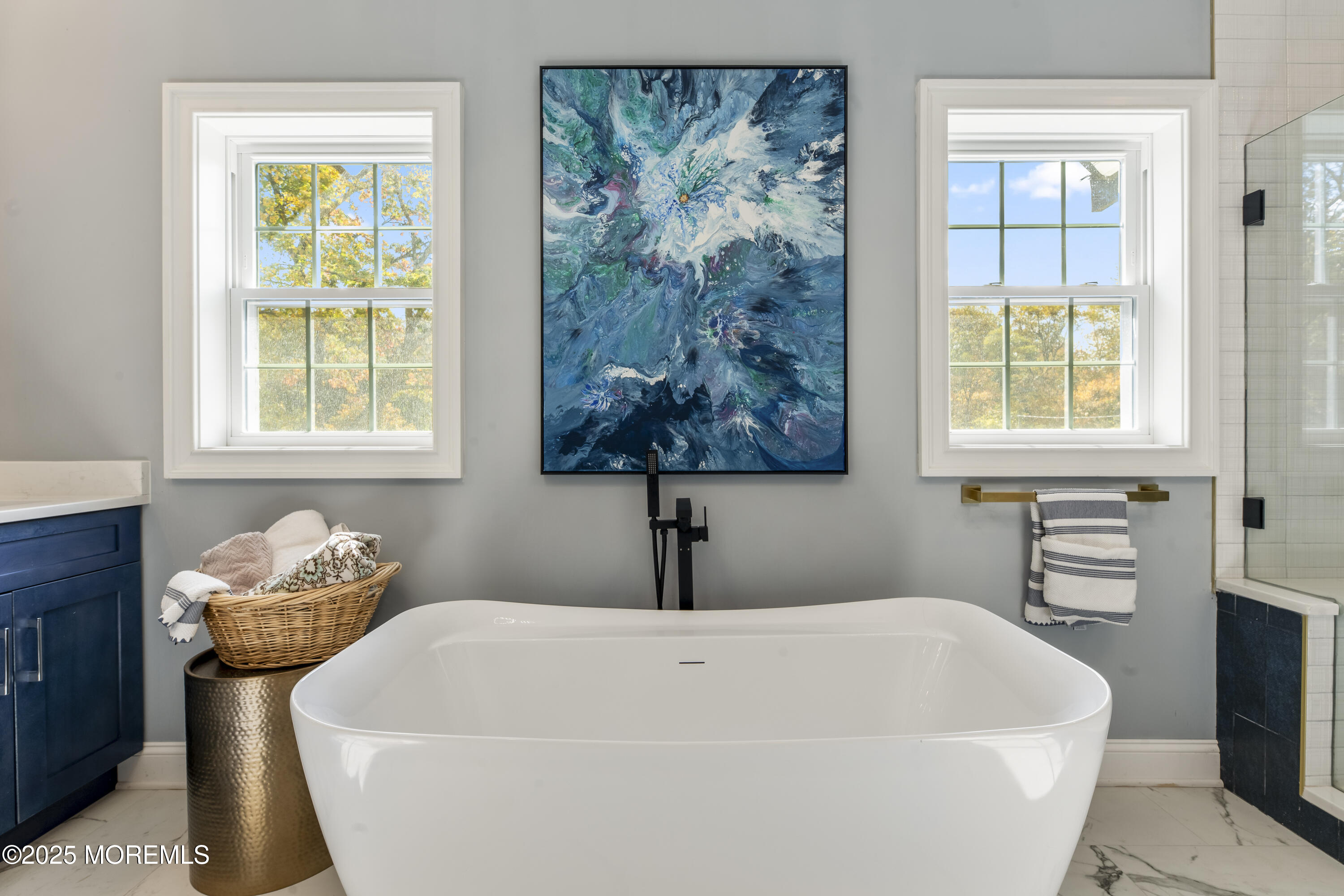 832 Holmdel Road Holmdel, NJ 07733 - Photo 26 of 44 a white bath tub sitting in a bathroom next to a window